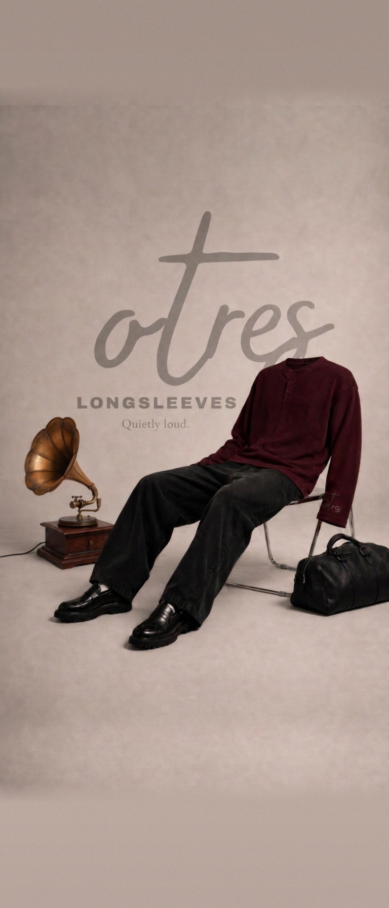 otres longsleeve campaign — burgundy waffle henley on a chair with a gramophone